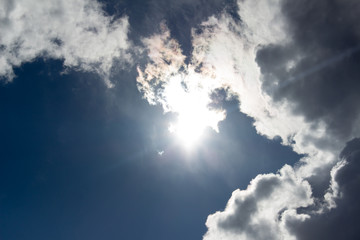 white clouds against blue sky