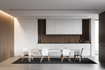 White and wooden kitchen, countertops and table