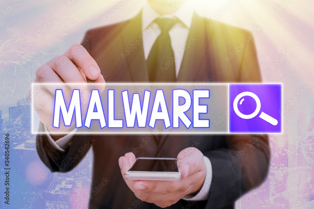 Poster handwriting text malware. conceptual photo malicious software or file that is harmful to a computer 