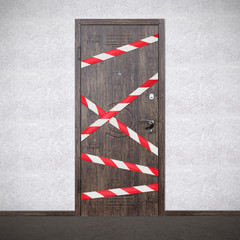 Hazard safety stripes across empty closed door