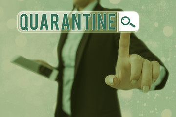 Conceptual hand writing showing Quarantine. Concept meaning restraint upon activities of...