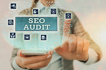 Handwriting text writing Seo Audit. Conceptual photo Search Engine Optimization validating and...