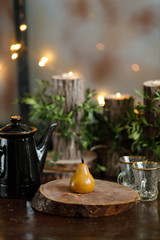 yellow pear cake on wooden background with bokeh lights