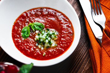 A plate of gazpacho on a table
