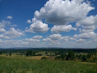 Fototapeta premium clouds and fields