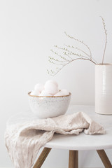 Rustic bowl of raw chicken eggs. Easter minimalism concept