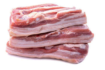pork brisket three pieces of stacke white background