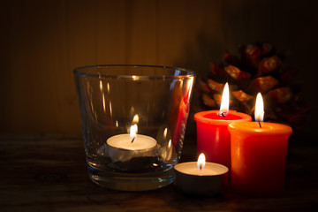 Fototapeta na wymiar candles in the glass
