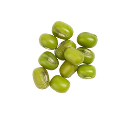 Some spread out green mung beans seen directly from above and isolated on white background