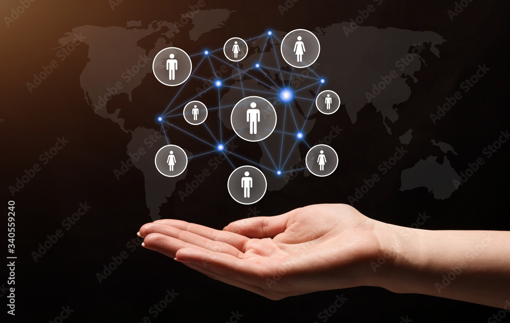Poster social connections in hand. dual screen with world map