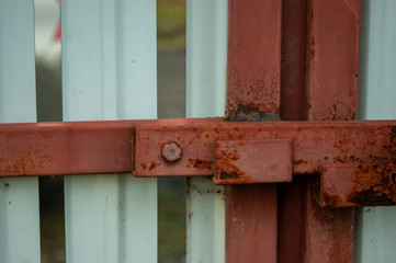 iron bolt on the gate in the village, Russia