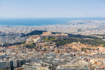 Fototapeta na wymiar cityscape of Athens in day time with the Acropolis seen from Lycabettus Hill, the highest point in the city