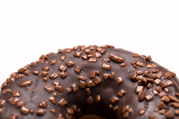 Chocolate donut on a white background close-up.