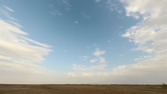 Time lapse during late afternoon in the Little Rann of Kutch a flat landscape and amazing cloud movement in Gujarat India