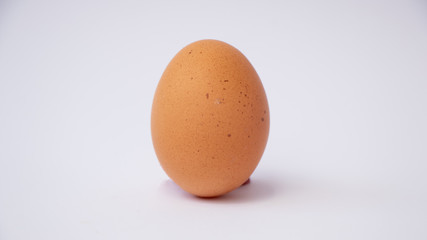 raw egg isolated on white background.