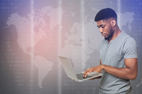 Hacker holding laptop with virtual display server data