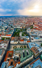 Europe hungary Budapest. Aerial panoramic cityscape about Budapest with epic sky. A Storm is  comming on the background.  Famous historical downtown in the foreground with ferris wheel.
