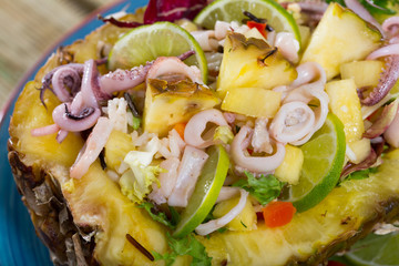 Salad with calamari, pineapple and lime