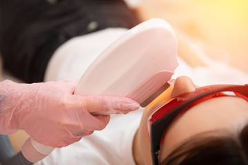 Naklejka premium Removal of unwanted hair laser Epilation on face mustache young woman. Concept beauty and health