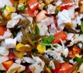 Salad of fresh vegetables as a background