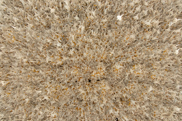 Many silver metal hanging top, with yellow color on the back Included is a metal background.