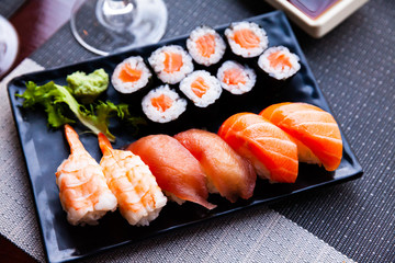 Combined sushi - maki salmon, nigiri variado closeup