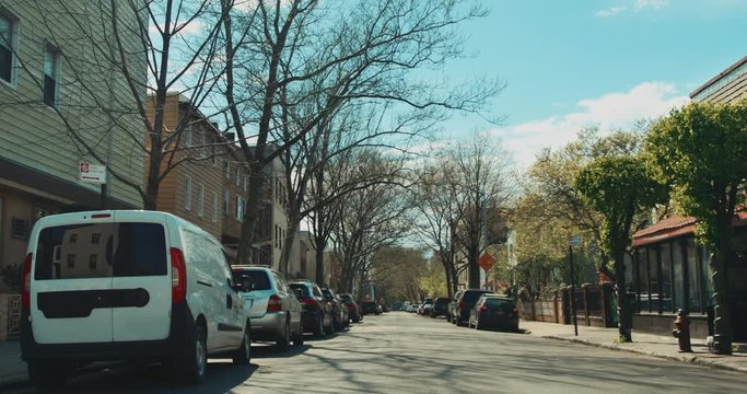 DX FIXED WIDE view of an emty streeet in Brooklyn, New York during coronavirus COVID-19 pandemic. All brand names and logos removed