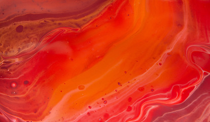 Liquid marbling paint background. Colorful acrylic mix