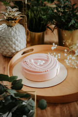 beautiful cake on a wooden table top, suede