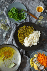 ingredients for kichari,  traditional Indian dish made of rice, legumes, vegetables and spices