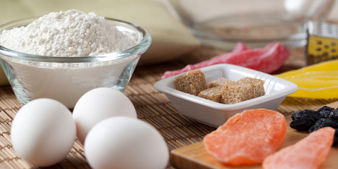 eggs, flour, brown sugar and dried fruits for making delicious homemade desserts