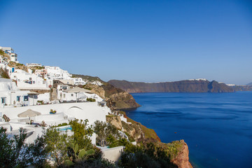 Fototapeta na wymiar Beautiful view of famous romantic white town in Santorini Island, Greece