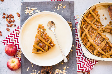 Apples fruits baked pastry pigtail pie or cake, tart. Sweet vegan non diary breakfast crumble...
