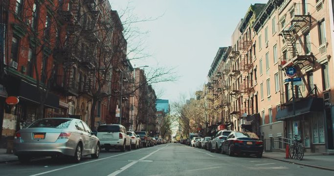 DX FIXED WIDE view of an emty streeet in Brooklyn, New York during coronavirus COVID-19 pandemic. All brand names and logos removed