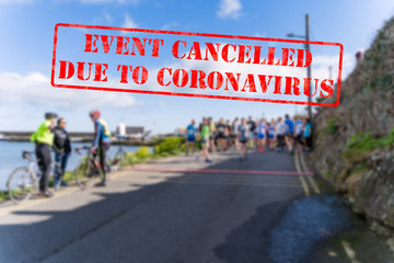 Defocused view of sport contestants for marathon race. Sports event cancelled due to coronavirus