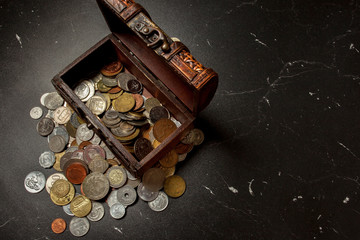 old coins collection in wooden chest box