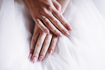 beautiful girl hands during wedding day
