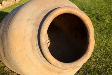 close up of big clay pot . Deep and dark hole