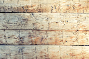 wooden boards fixed with screws for confinement. wood background