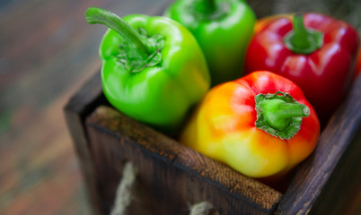 Creative healthy composition with organic paprika on wood