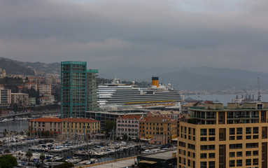 Large white cruise ship in the port of Savona, Italy