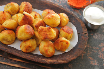 
dumplings, ravioli, fried with spices and sauce.