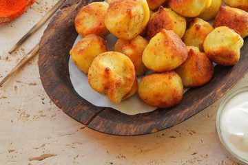 
dumplings, ravioli, fried with spices and sauce.