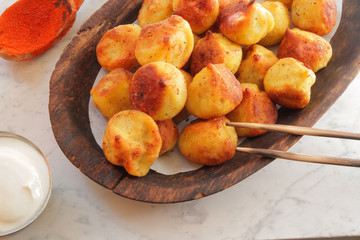 
dumplings, ravioli, fried with spices and sauce.