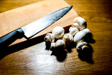 Cut mushrooms on a wooden board