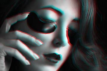 Anaglyph effect of woman with fashion dark makeup and black under eyes hydrogel patches.
