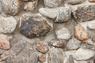 Fototapeta na wymiar Wall lined with natural stone