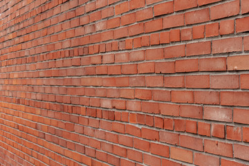 Exterior brick wall. Horizontal masonry.  Red brick. Brick textures.