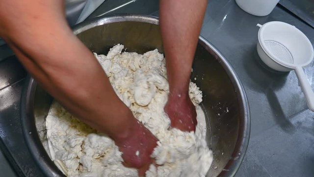 preparation of mozzarella in a dairy. mozzarella production: italian cheese factory, mozzarella, fresh cheese