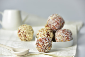 Middle Eastern, ball-shaped dessert made of dried apricots with various coatings. Energy balls.